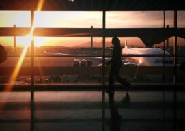 silhouette of person walking in airport